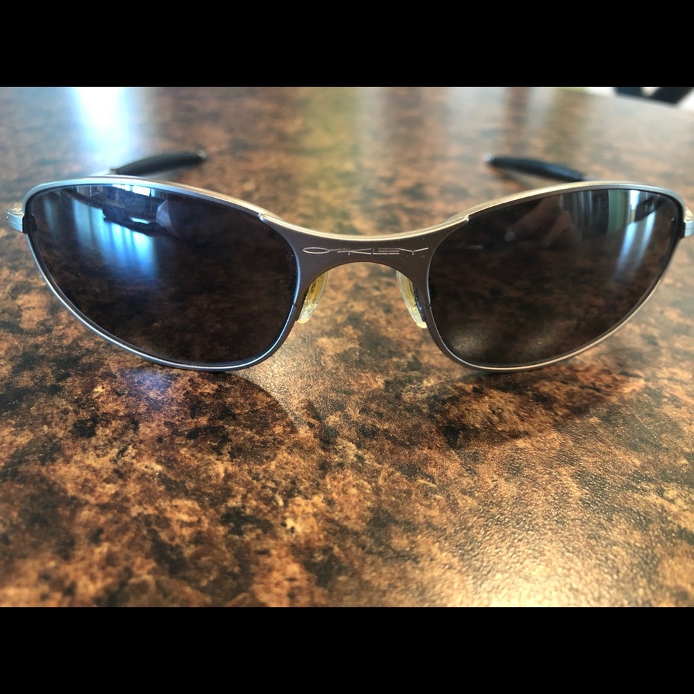 Oakley Sunglasses. Silver Metal Frame